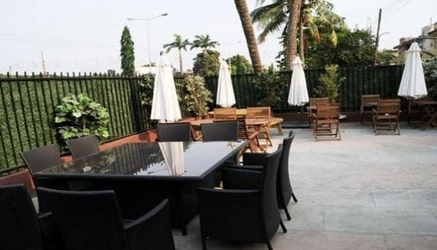 Barista carefully preparing coffee
